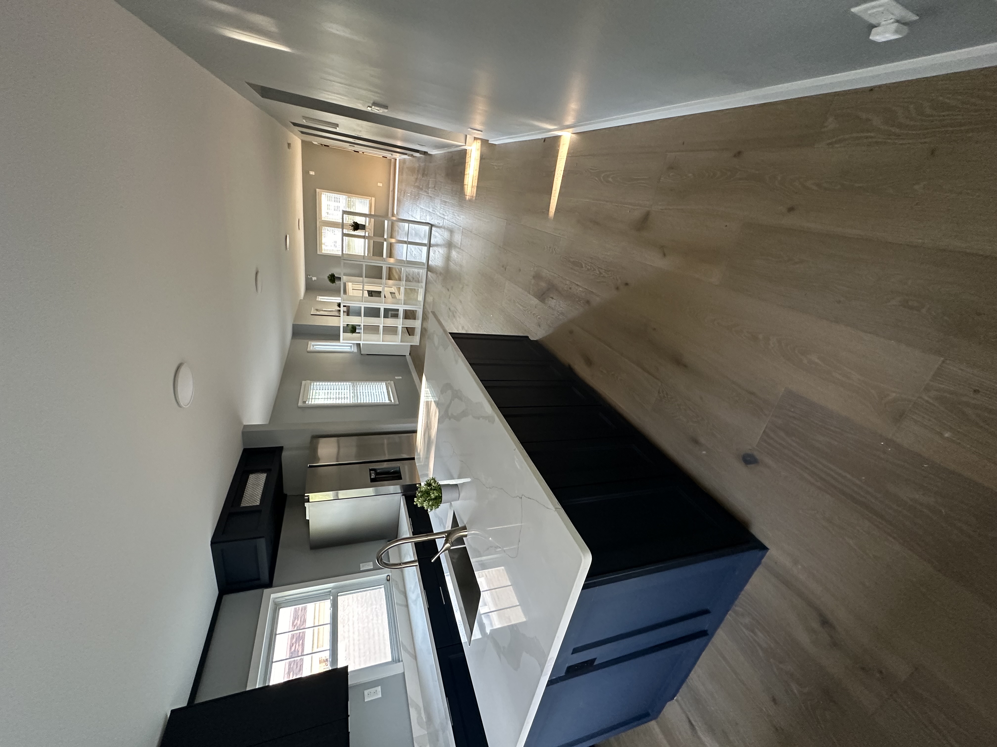 Kitchen flowing into the open living space