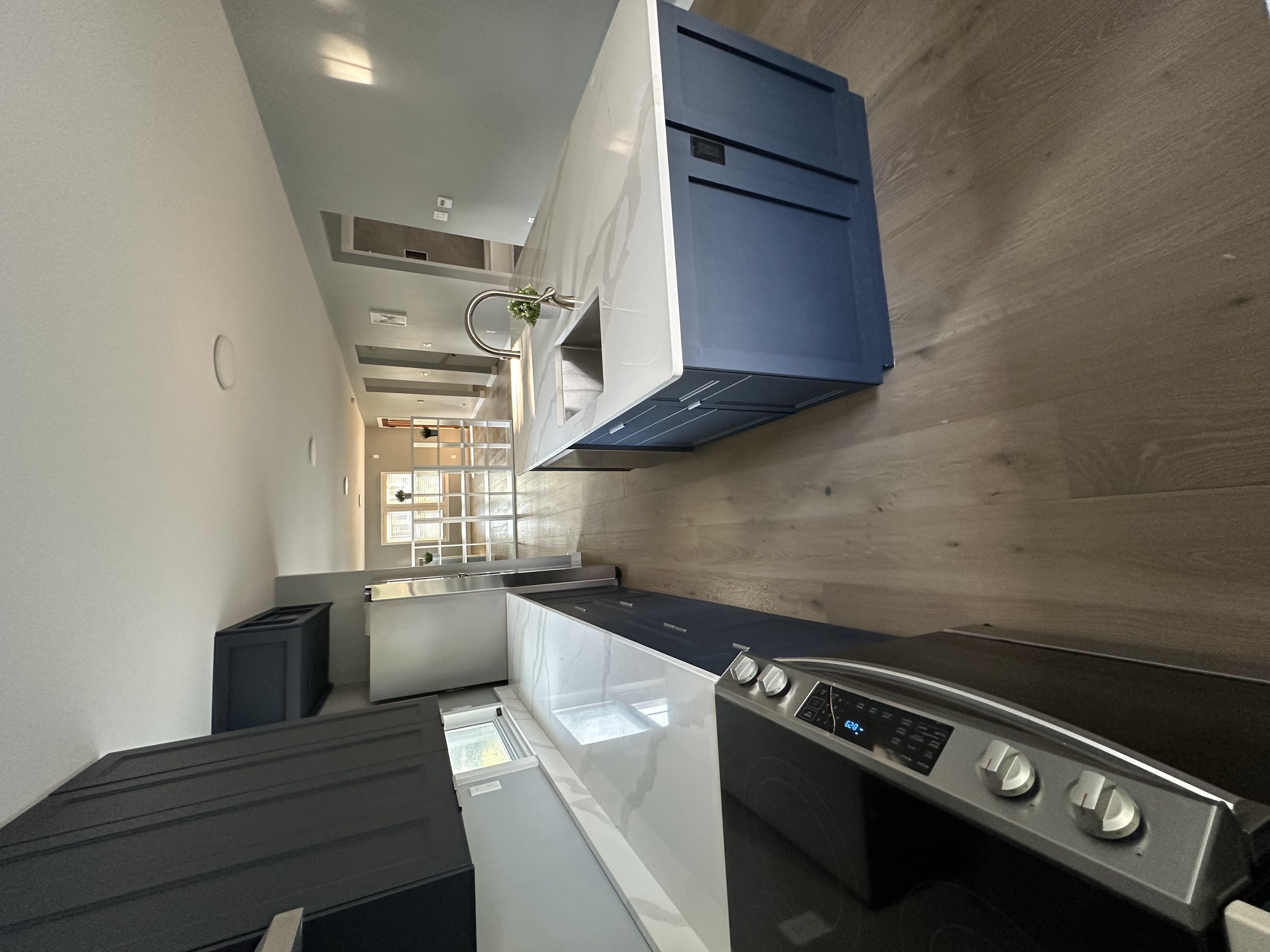 Kitchen with stove and island