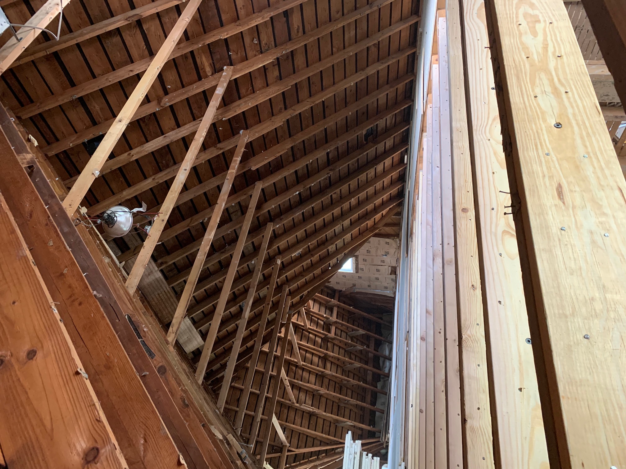 Frame opened to the studs — engineer-reviewed