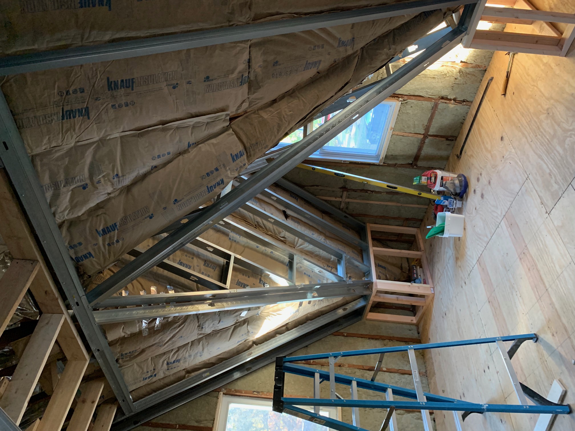 Steel structural members supporting the new rafter system